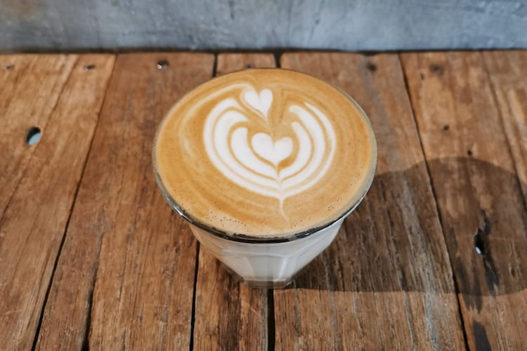 latte art on cortado
