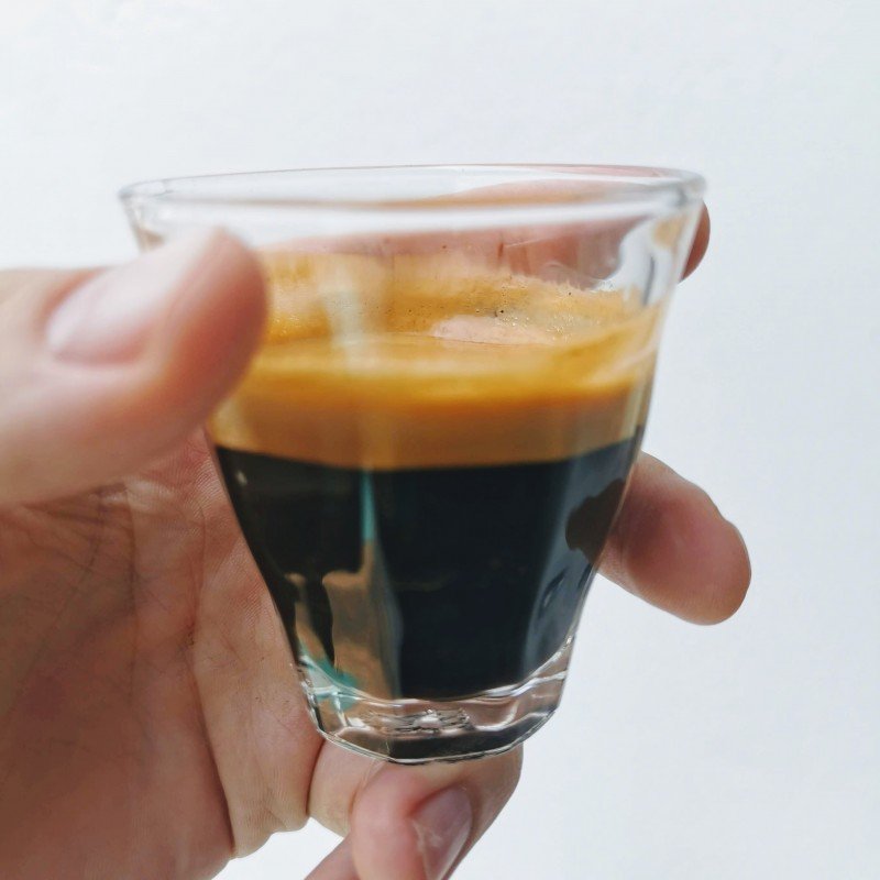 espresso coffee shot pulled with fresh beans
