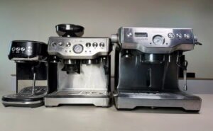 Breville Barista Express vs Bambino Plus vs Dual Boiler next to each other on table