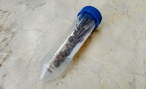 coffee in a lab sample container