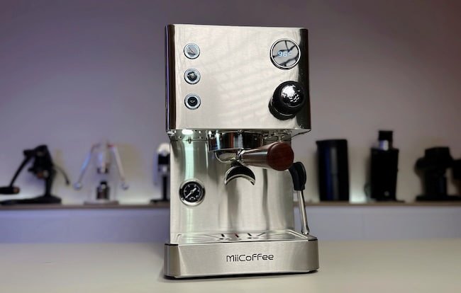 Miicoffee apex espresso maker on a table, bokeh background