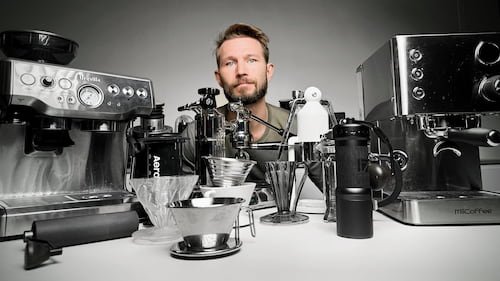 Coffee Chronicler Asser Christensen with a lot of coffee equipment
